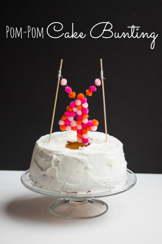 Pom-Pom Cake Topper | 
Covered with cute pompoms and it’s great for decoration every cake or cupcake

You will Need :
– Small pom-poms
   – Piece of cardboard
  –  2 bamboo skewers
    – Pen
  – Ruler
 – Needle and thread
 – Hot glue gun

Have Fun… :)