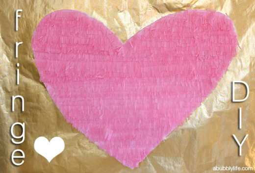 Fringe Over-Sized Heart DIY

Materials:
– Foam Board or Cardboard
– Pencil
– Tissue Paper
– Fringe Scissors
– Standard Scissors
– Mod Podge
– Small Paint Brush