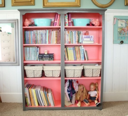 Coral & grey book shelves One color on the outside and another in the inside of a book case!